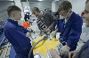 Vehicle body and paint operations students and mechanic tutor