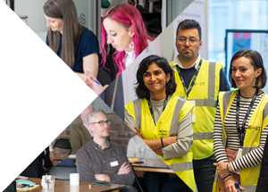A collage of diverse individuals in various settings: one group in a meeting, another in safety vests engaged in conversation.