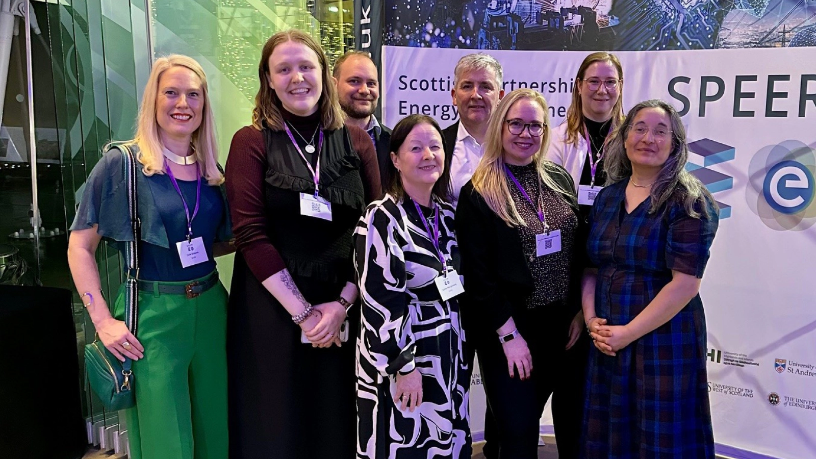 group photo of the clean energy team in front of SPEERI banner
