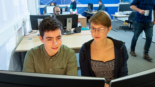 Students at Edinburgh Napier University at computer screen.